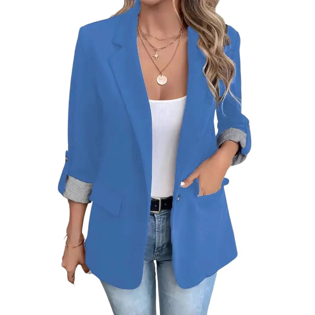 A vibrant royal blue women striped cuff single button blazer with rolled-up sleeves revealing striped inner lining