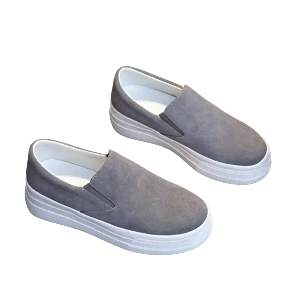 Women suede platform slip on sneakers in gray suede with a thick white rubber sole for casual wear