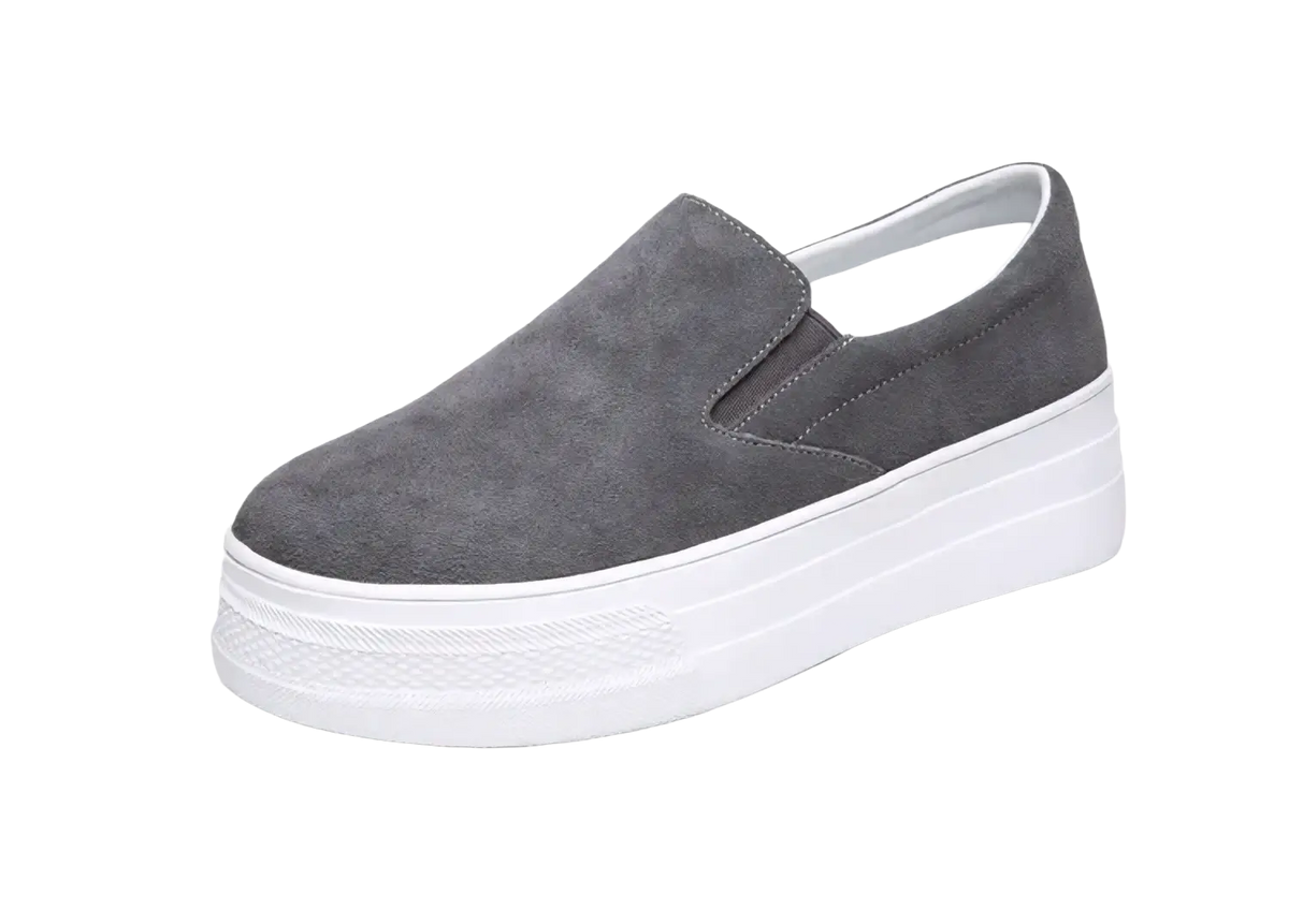 Women suede platform slip on sneaker in gray with a thick white sole for casual wear