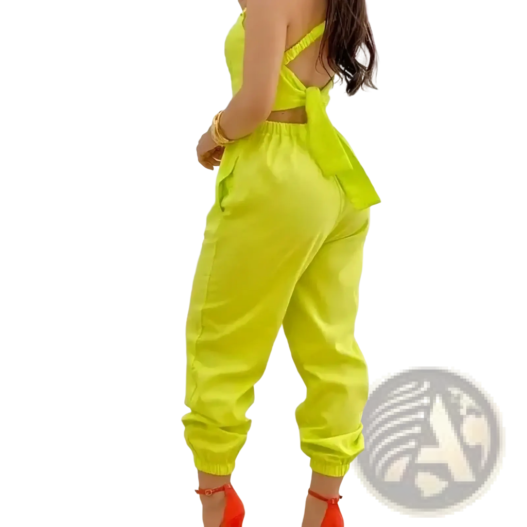 Bright neon green women summer printed cutout two-piece jumpsuit with ruffled straps and tied-back design shown from back