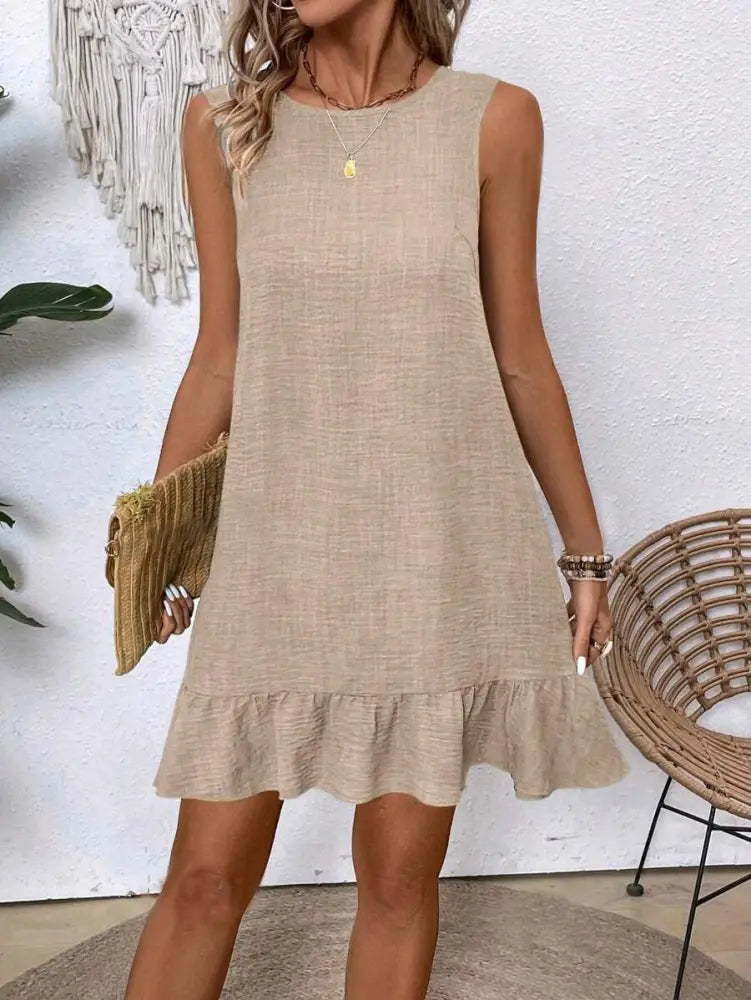 Beige sleeveless linen dress with ruffled hem designed for summer vacation and beach wear