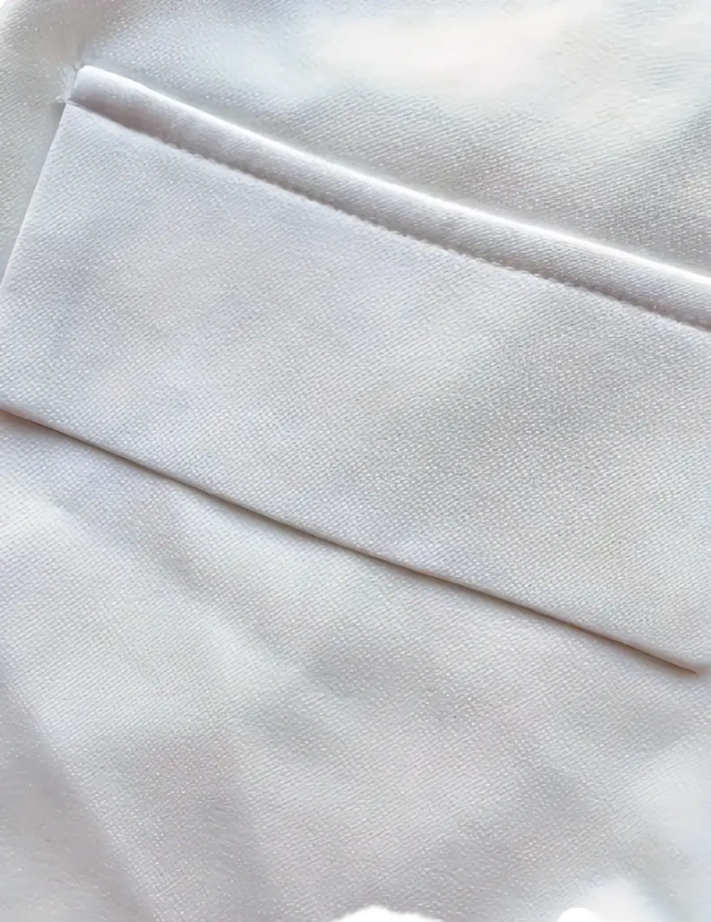 White tailored twill blazer for women with smooth satin-like fabric and neatly stitched seams for casual work wear
