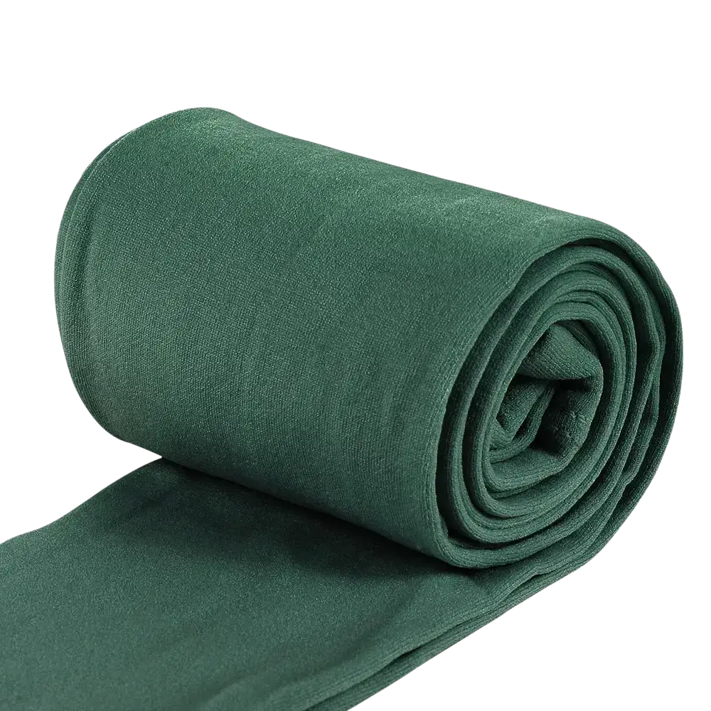 Dark green women thermal fleece lined leggings rolled neatly showing soft textured material for cold weather use