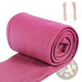 A rolled-up pair of vibrant fuchsia women thermal fleece lined leggings with soft smooth fabric texture