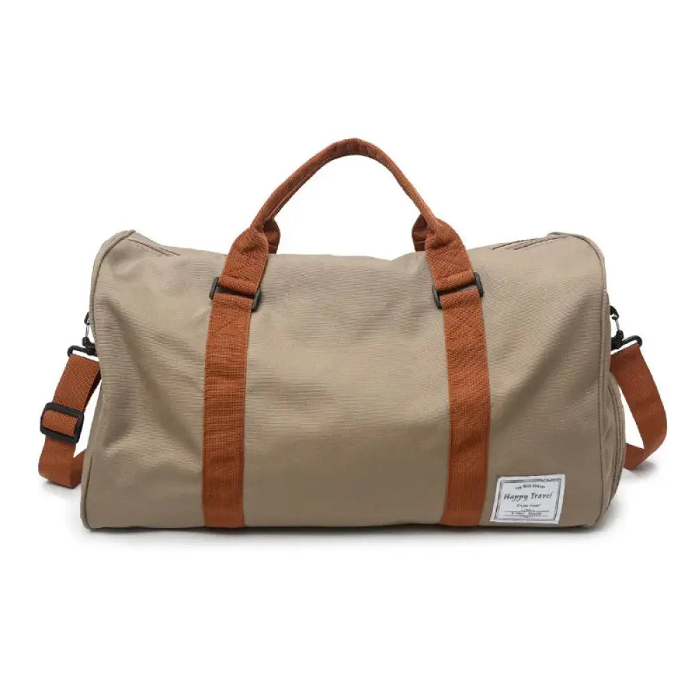 Beige canvas women’s gym and weekend travel duffel bag with brown webbing straps and white label