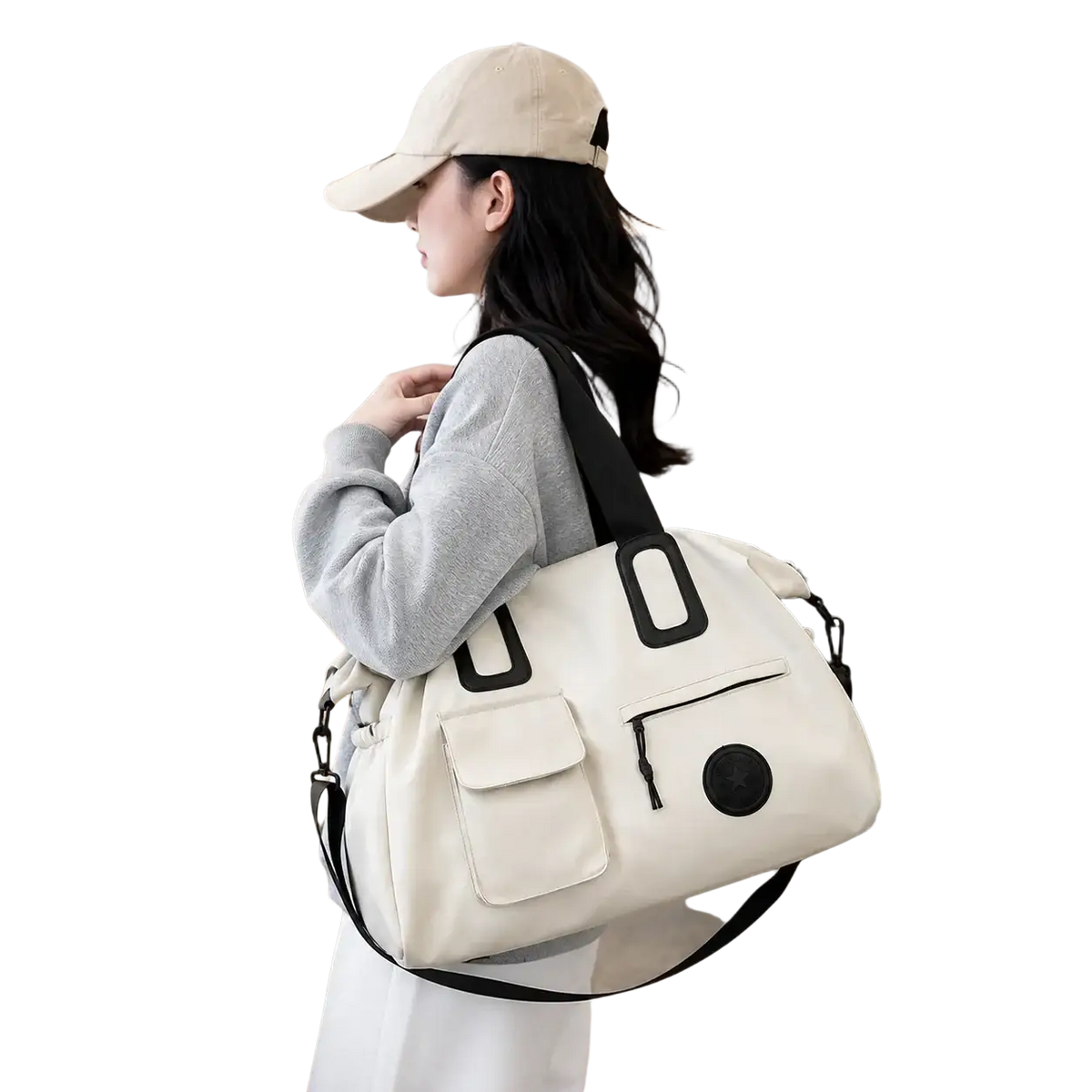 Cream-colored canvas women travel duffel bag with black fabric handles and accents large carry on tote