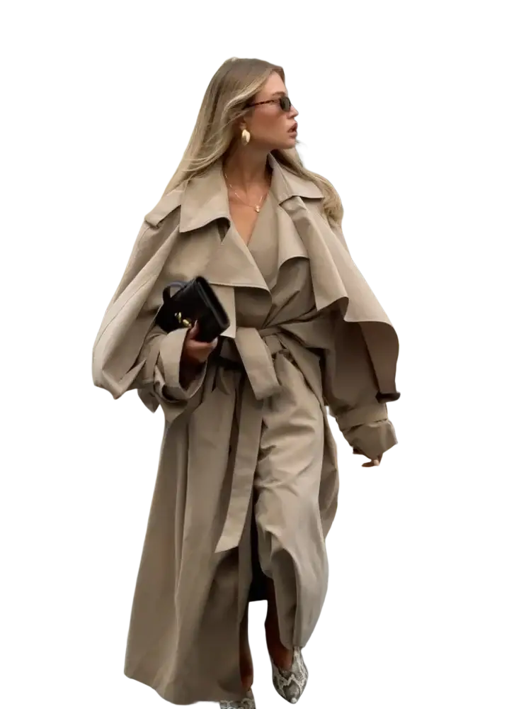 Beige trench coat with wide lapels and belted waist designed as long casual outerwear for women