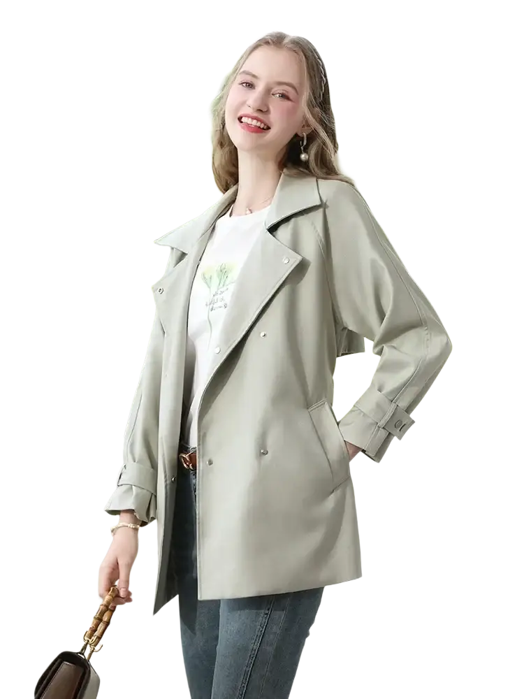 A light beige women trench coat long double breasted outerwear with buttoned cuffs and classic design