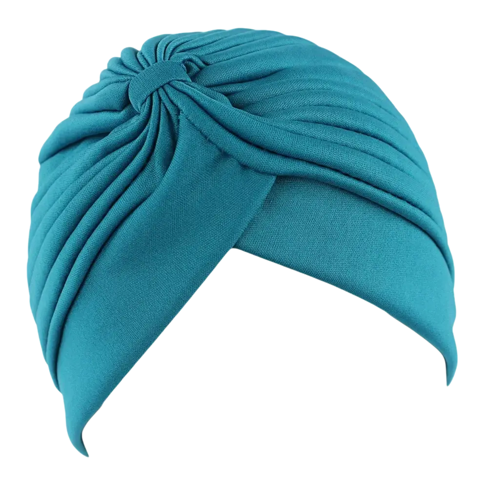 A teal soft stretchy women turban hat with a knotted elegant fold design suitable as a chemo cap