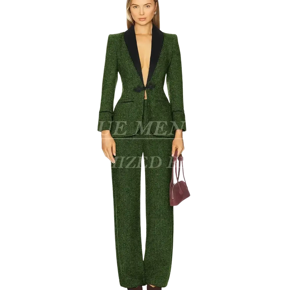 Emerald green tweed women pant suit with textured blazer featuring black satin lapels and matching wide-leg pants for office