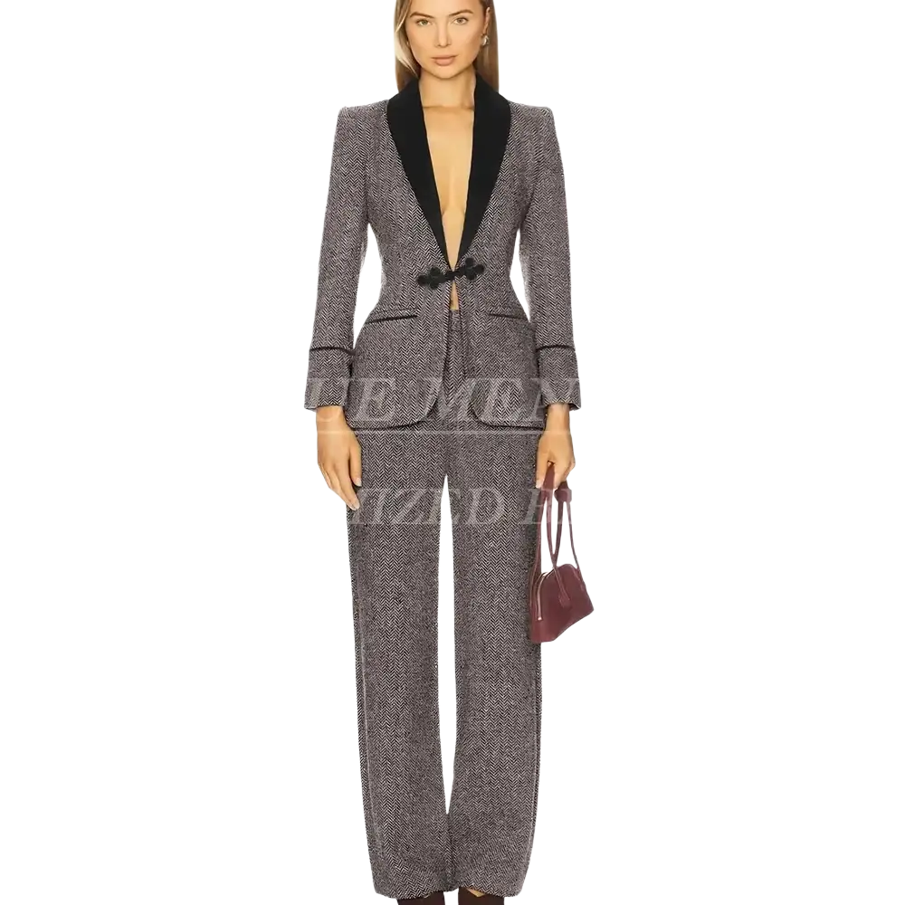 Women tweed pant suit featuring a slim fit gray herringbone blazer with black velvet collar and matching bow tie