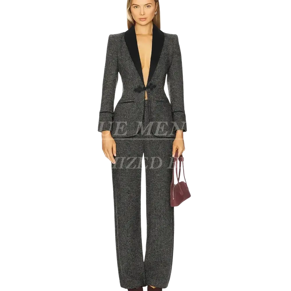 A stylish gray herringbone tweed pant suit with black velvet lapels and wide-leg pants for office wear