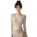Beige slim fit design women v-neck long sleeve yoga top with wrap-style crop and matching high-waisted skirt