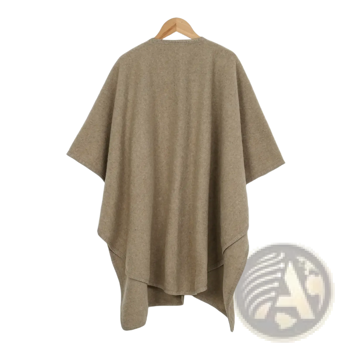 A soft beige woolen poncho with relaxed fit and asymmetrical hemline hanging on a wooden hanger