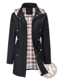 Women waterproof hooded trench coat in black with plaid-lined hood and front pockets made of waterproof material