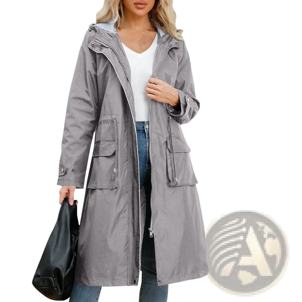 Women waterproof hooded trench coat in gray with front zipper closure and two large side pockets for outdoor use