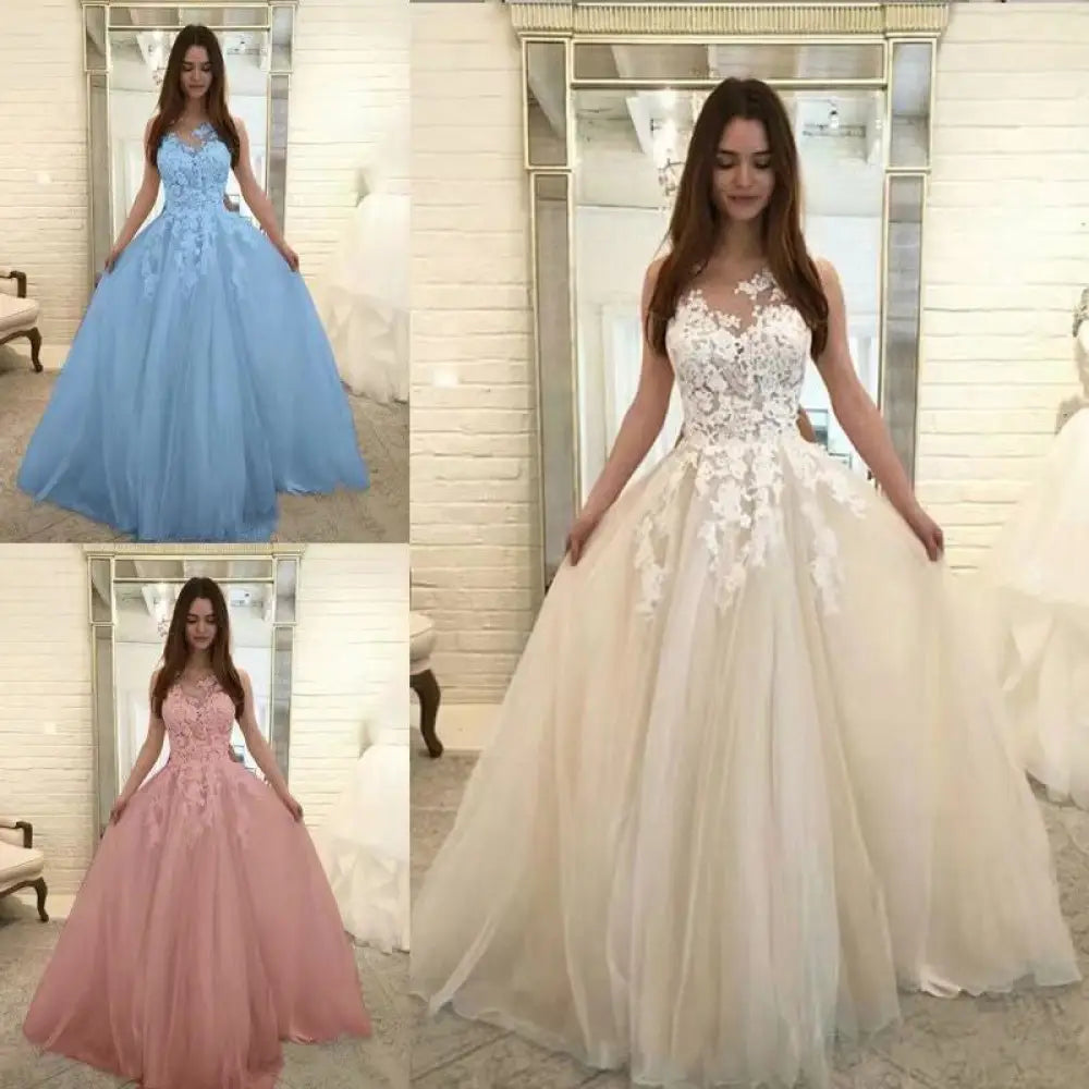 A woman models sleeveless lace and tulle floral wedding gowns in light blue white and pink with intricate appliqués