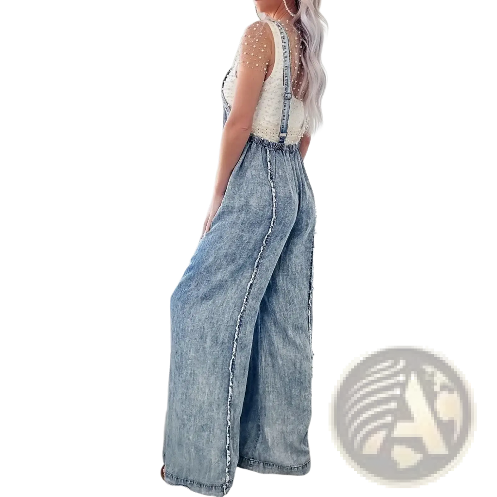 Women wide leg denim jumpsuit in faded blue wash with decorative frayed trim along the sides vintage style