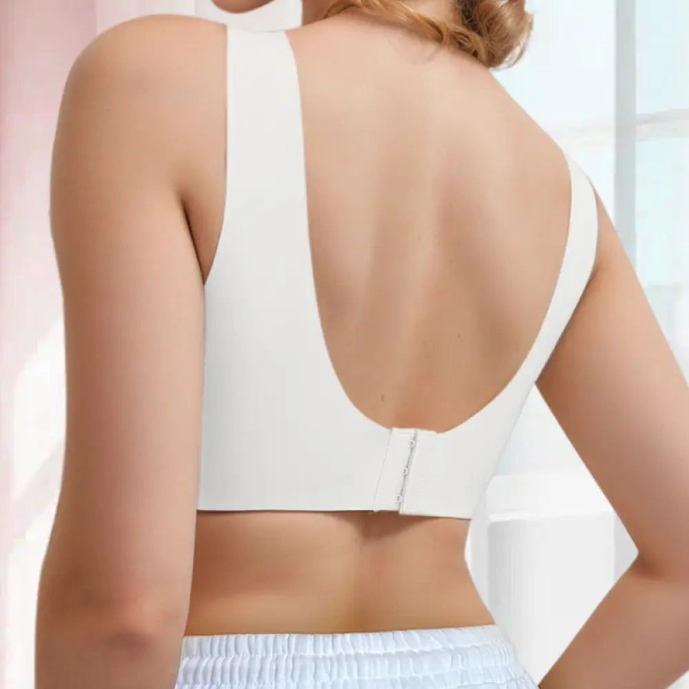 White seamless sports bra with back zipper and wide shoulder straps from seamless love sports push up collection