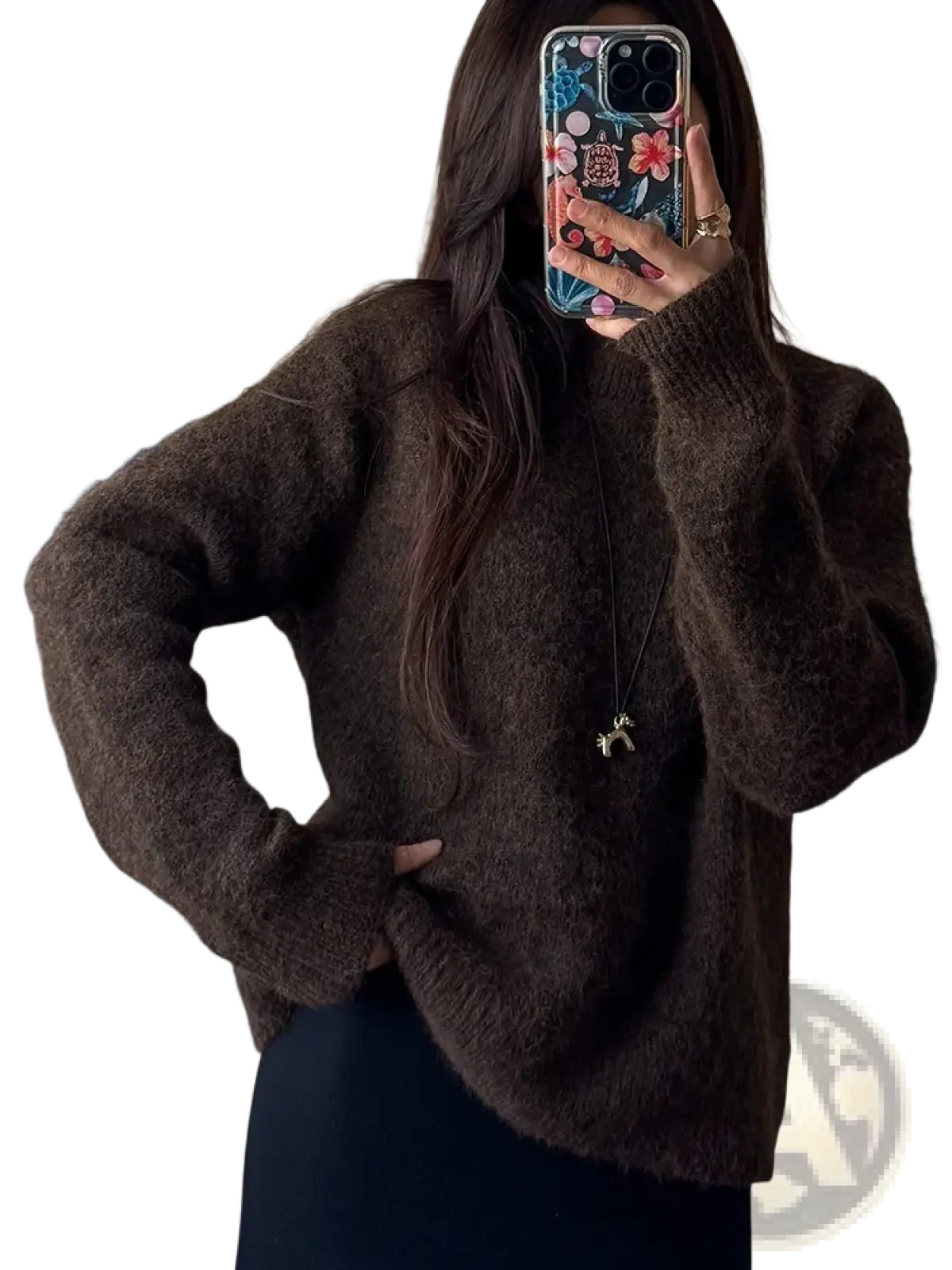 A cozy chocolate brown fuzzy knit pullover sweater for women with relaxed fit and ribbed cuffs for winter wear