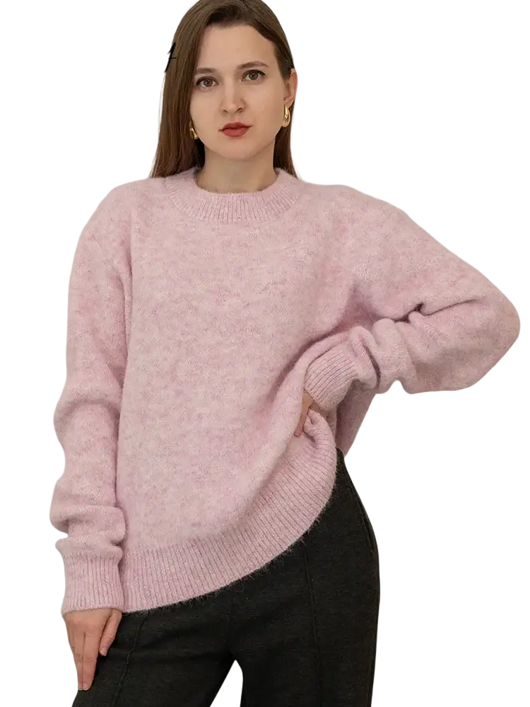 A soft dusty pink oversized knit sweater with ribbed crew neckline and cuffs for women winter wear