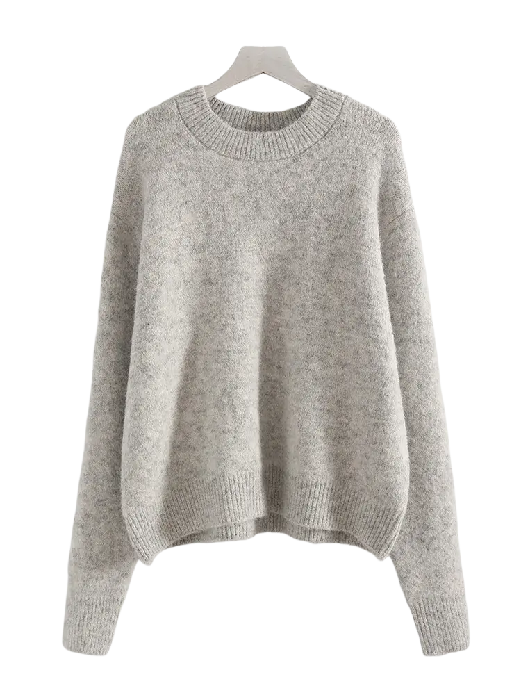 A women winter knit pullover sweater in soft heather gray with relaxed fit and ribbed cuffs made of knit material