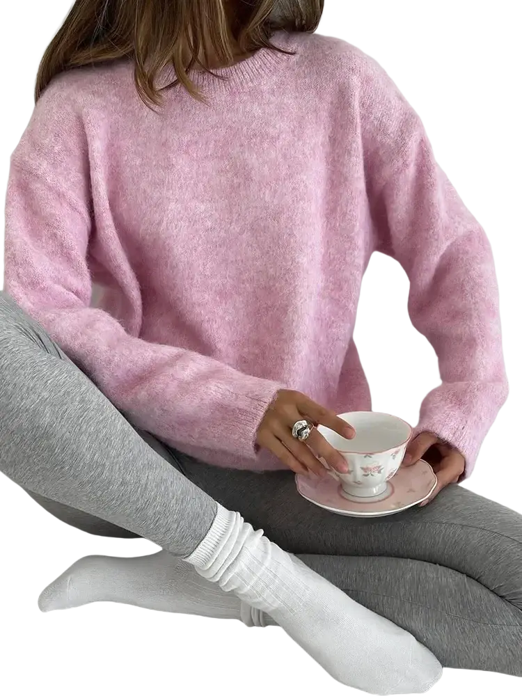Women winter knit pullover sweater in soft pink fuzzy knit with a relaxed fit for cold weather comfort
