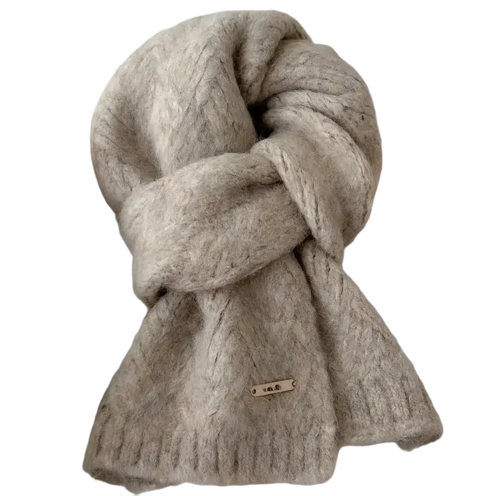 A cozy light beige women winter knit scarf with textured cable pattern and small metallic tag neck warmer