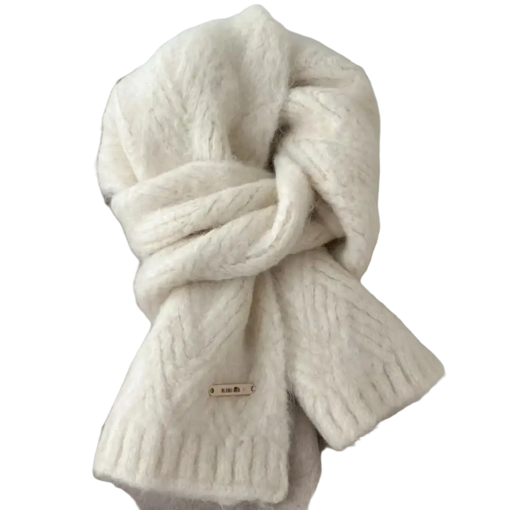 Cream-colored chunky knit women winter scarf with textured cable pattern and ribbed edges for warmth and style