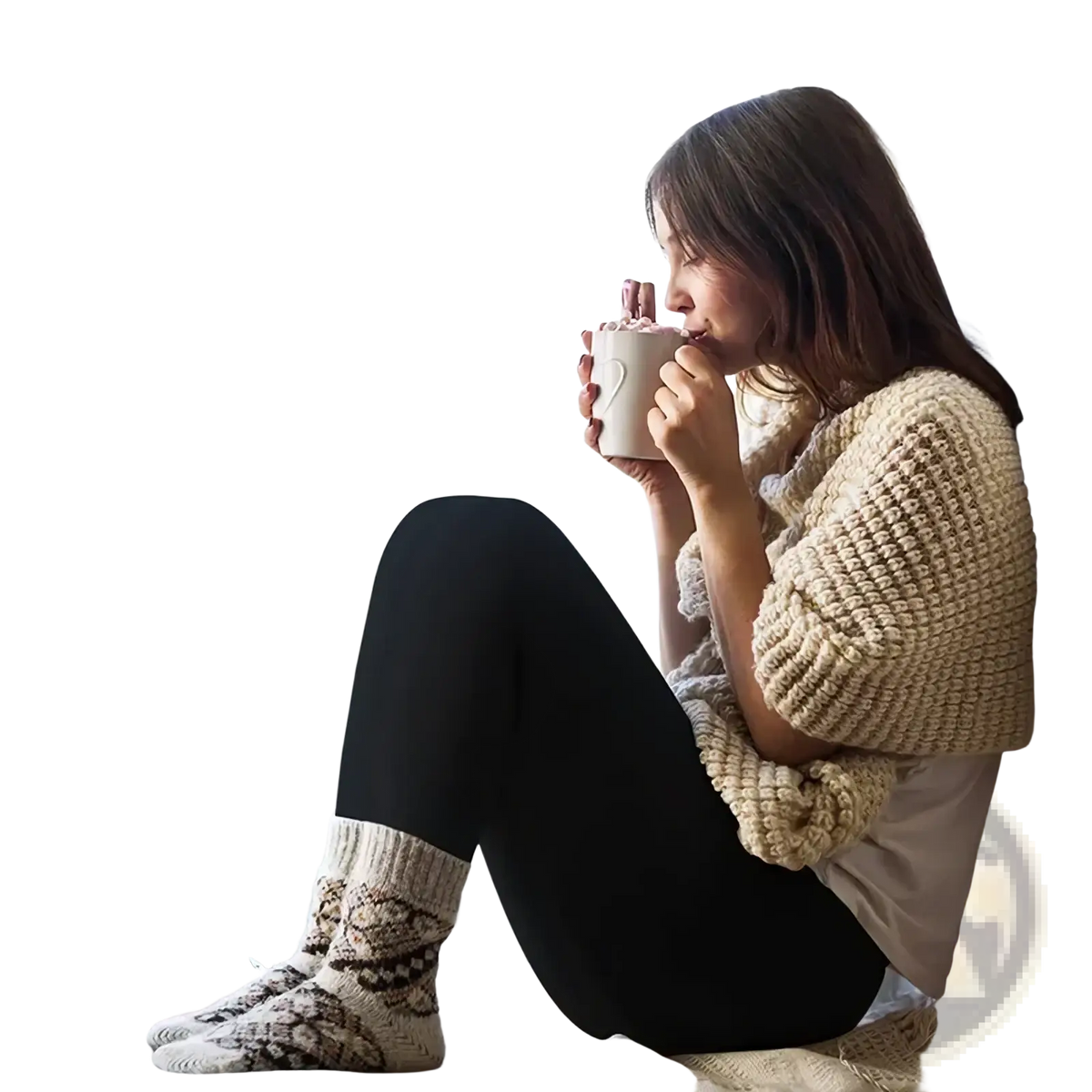 Cream-colored knitted sweater with a chunky textured weave paired with women winter warm fleece lined leggings