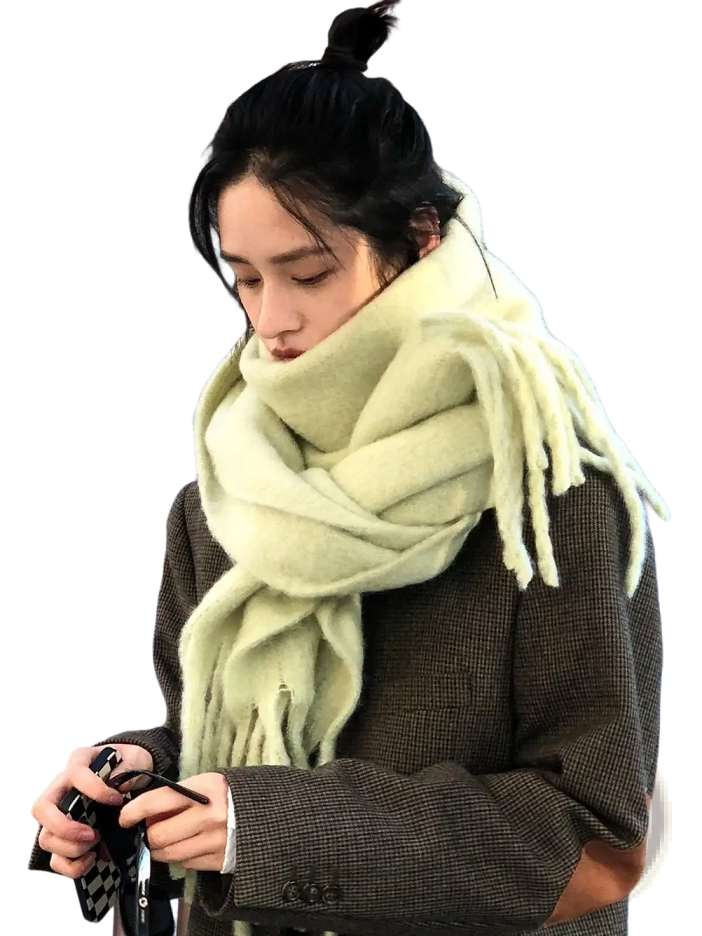 A soft pale green woolen pashmina shawl scarf with fringed edges for women winter warmth solid color