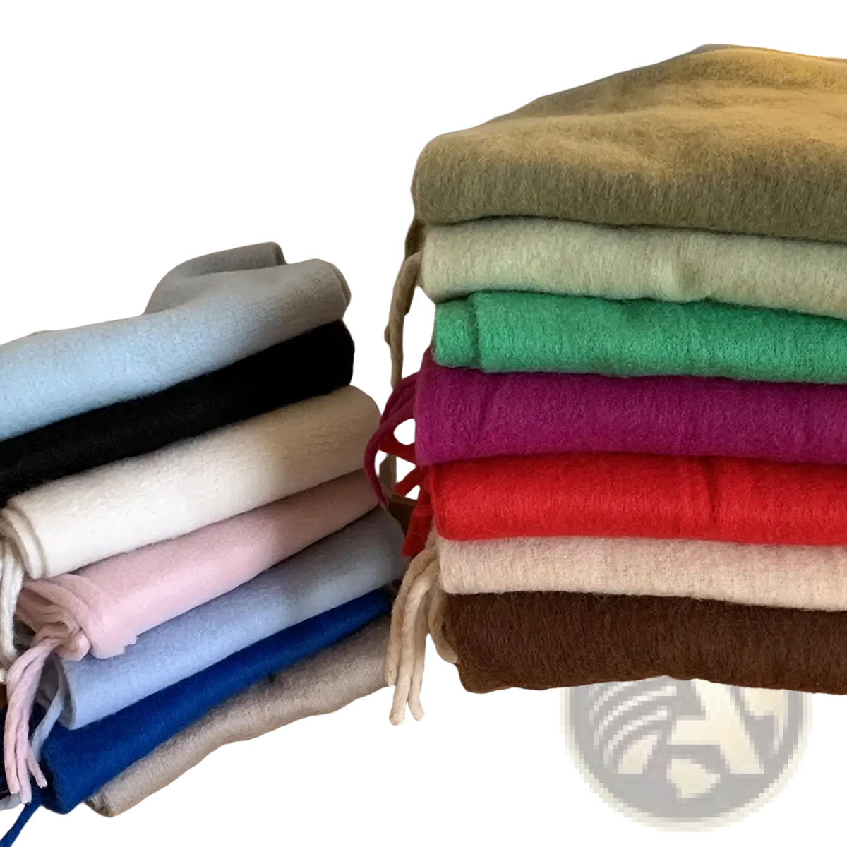 Stack of colorful soft felt women winter warm solid color pashmina shawl scarves in earthy and pastel tones