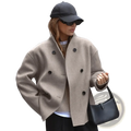 Beige wool women wool double breasted coat with black buttons featuring a classic double-breasted design