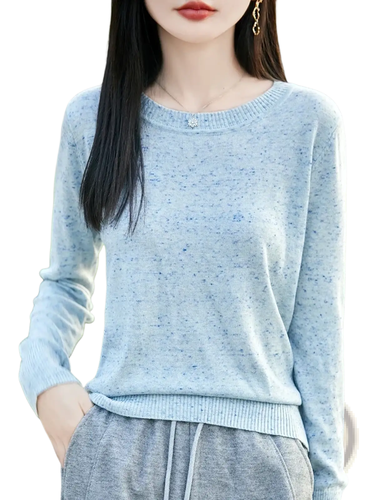 Women wool pullover sweater in light blue speckled knit with round neckline and ribbed cuffs, itch free and comfortable