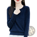 A navy blue sparkly wool women pullover sweater with long sleeves and a round neckline itch free knit top