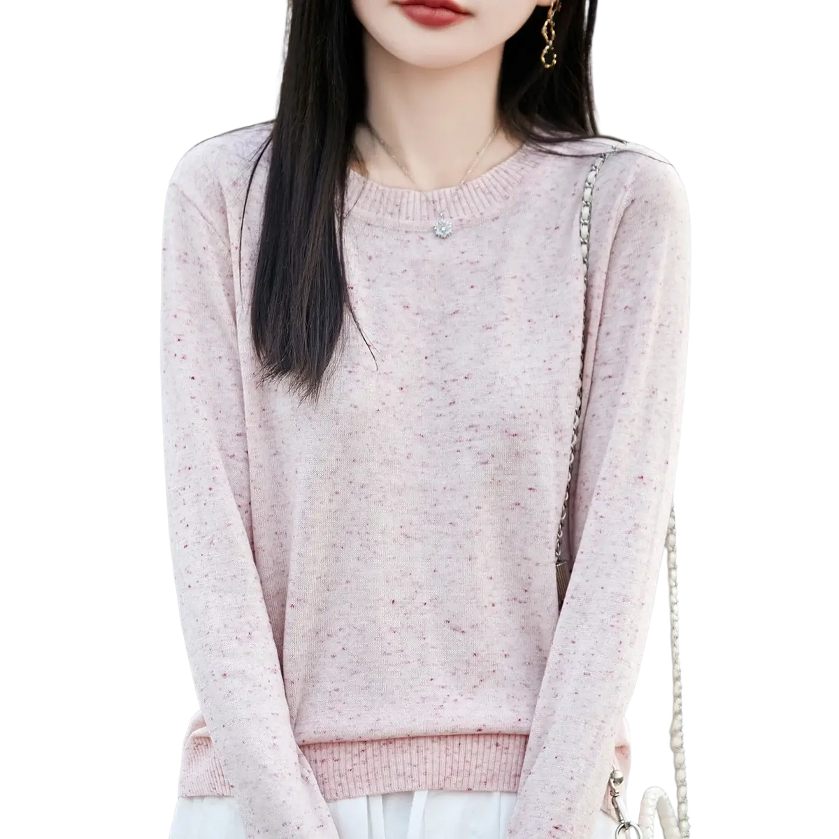 Women wool pullover sweater in soft pink with subtle speckled pattern and ribbed cuffs for itch free comfort
