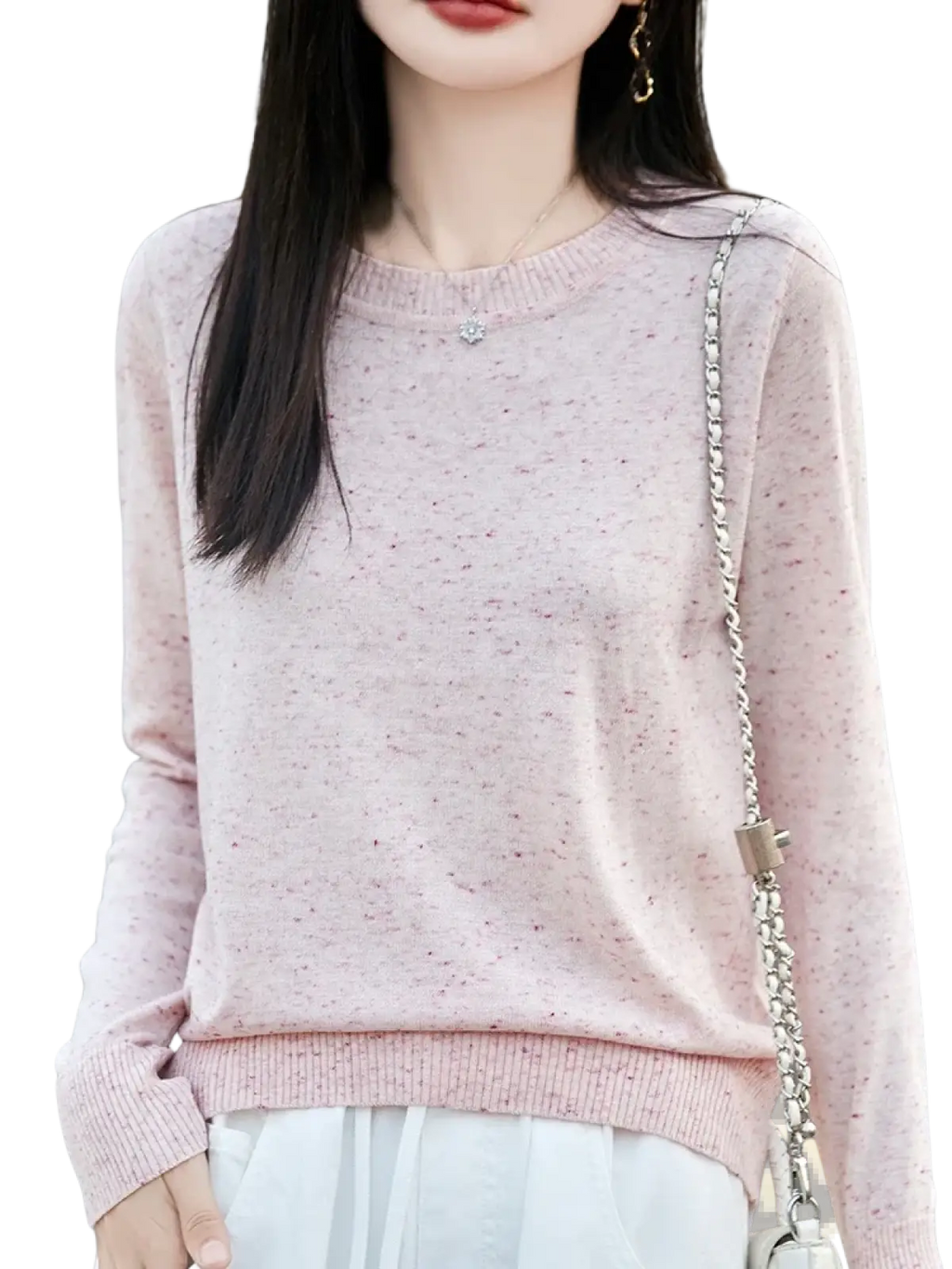 A soft pink women wool pullover sweater with itch free knit fabric and subtle speckled pattern with ribbed cuffs