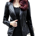 Women’s black faux leather biker jacket with zipper details and chain accents on black leather moto jacket