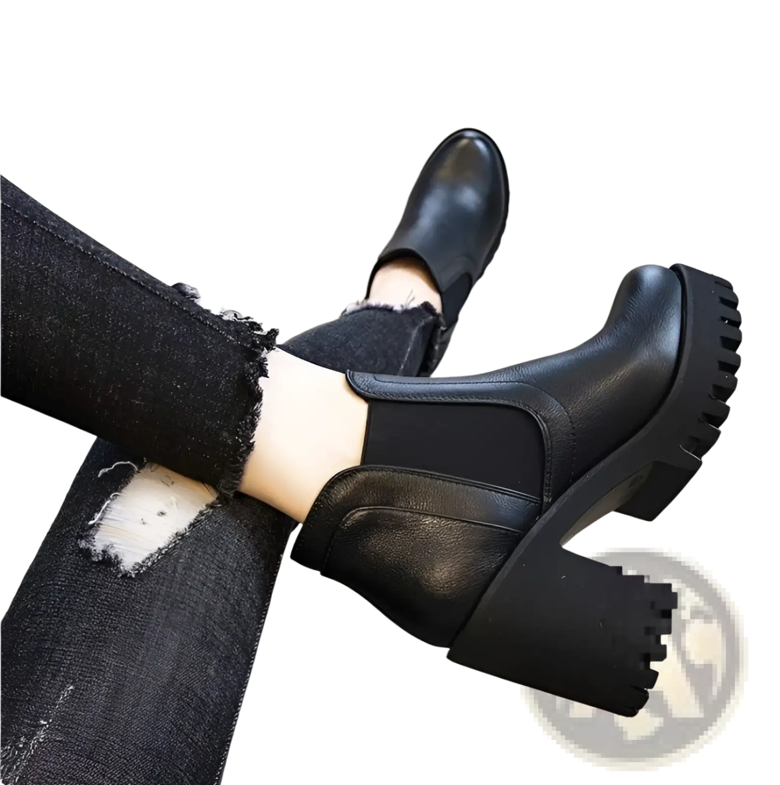 Women’s black leather chunky heel ankle boots with a textured rubber sole and a block heel for stylish comfort