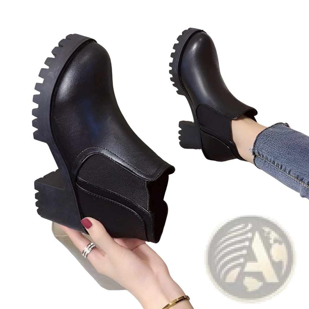 Womens black leather chunky heel ankle boots with textured soles and low block heel for stylish comfort