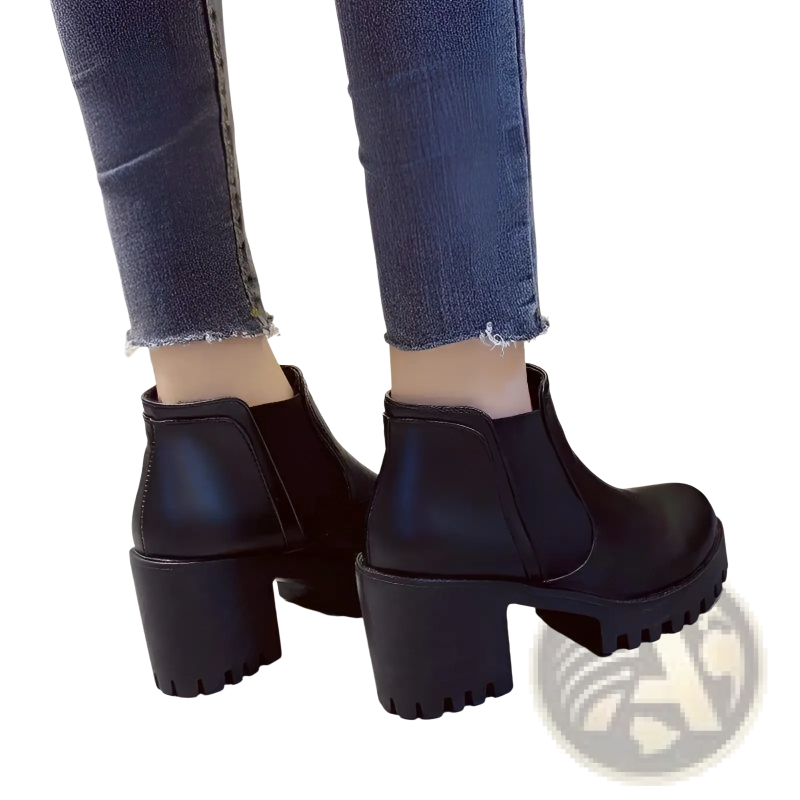 Women’s black leather chunky heel ankle boots with textured block heels shown from the back side