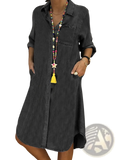 Dark gray denim shirt dress for women with button front, rolled sleeves, and front pockets