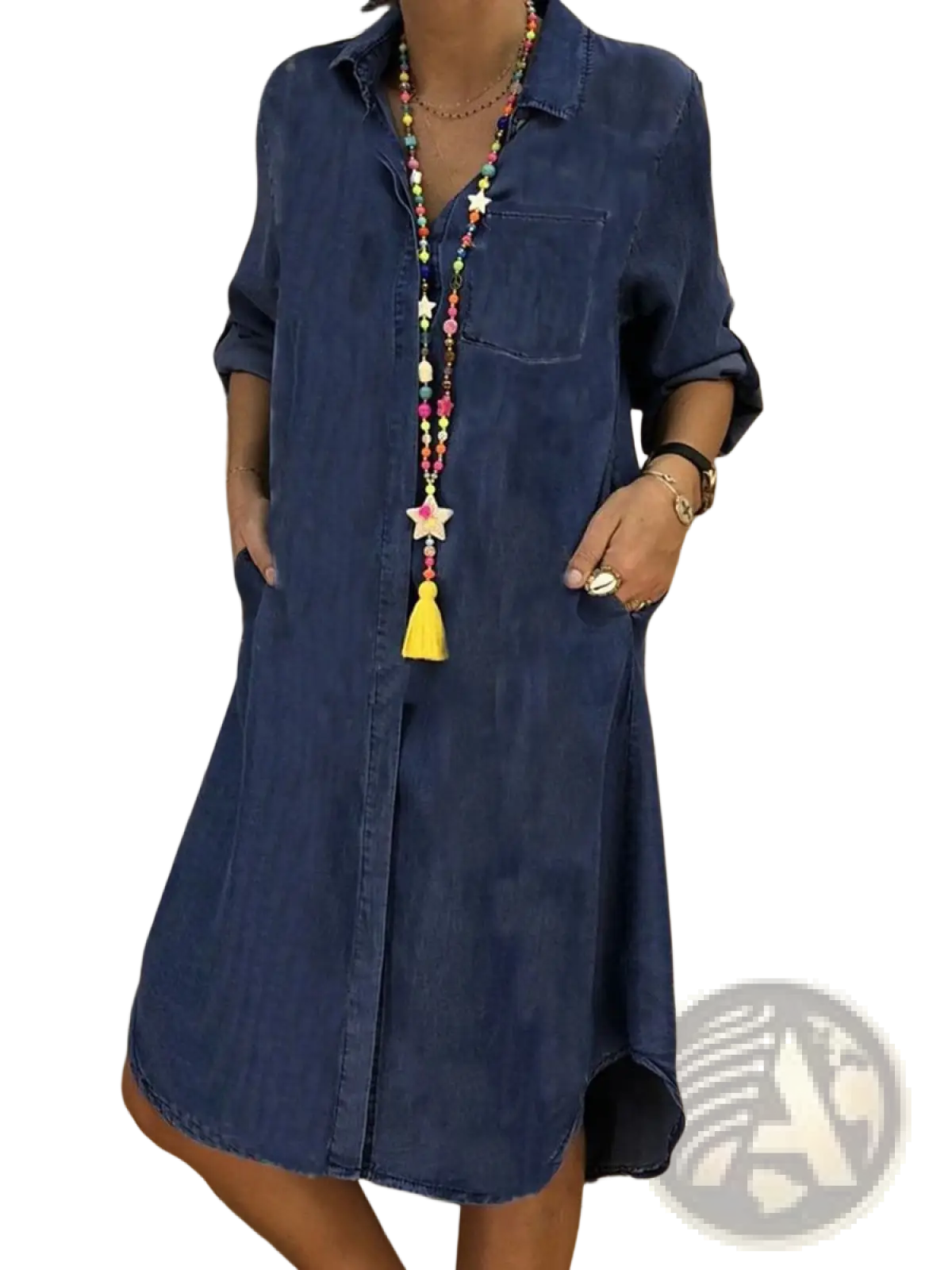 Women’s blue denim shirt dress with button front, rolled sleeves, and front pockets in cotton fabric
