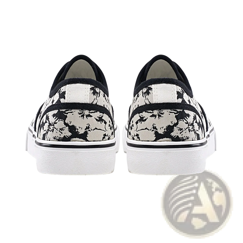Women’s canvas lace up low top casual sneakers with black and white floral pattern and textured rubber sole