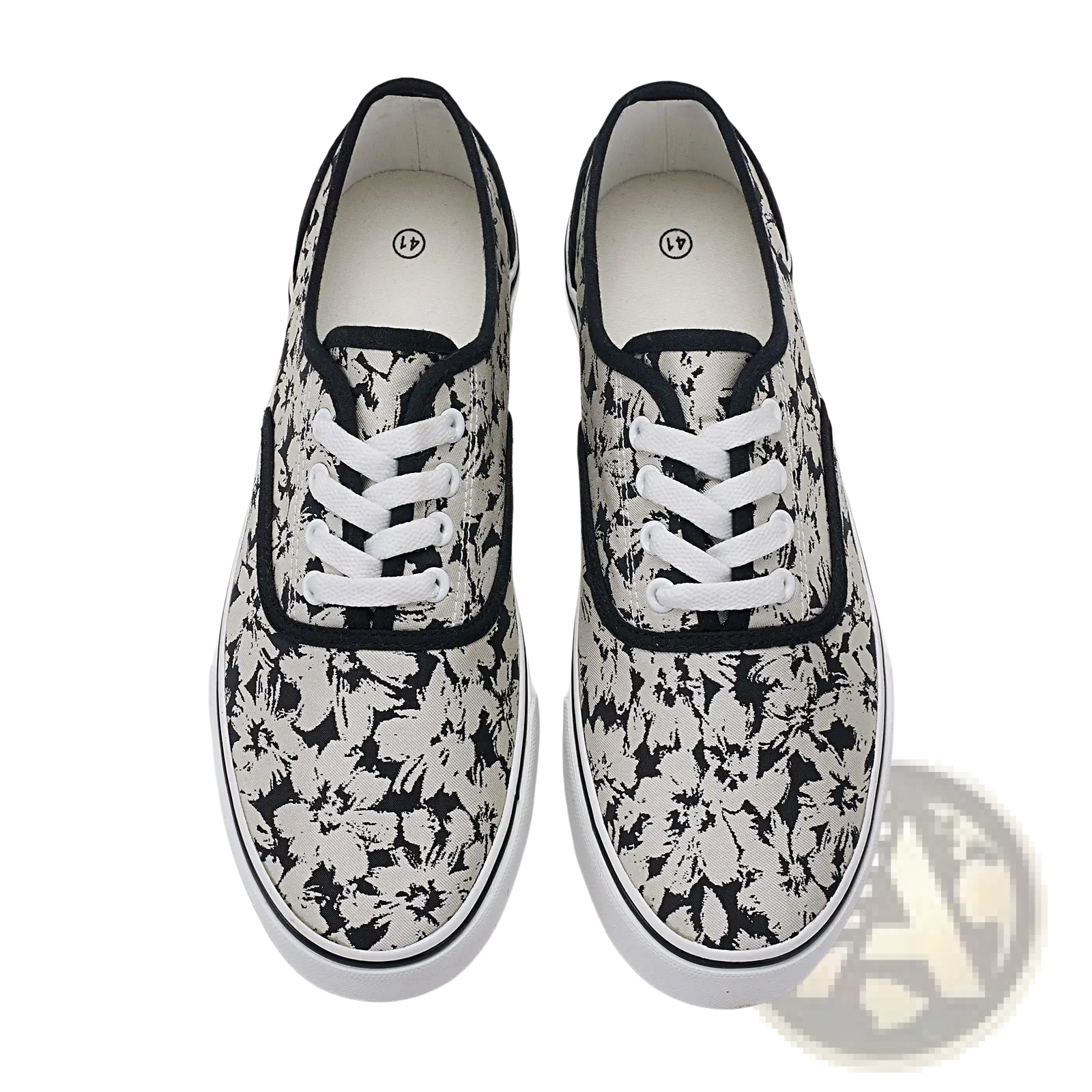 Women’s canvas lace up low top casual sneakers in black and white floral pattern with contrasting black trim