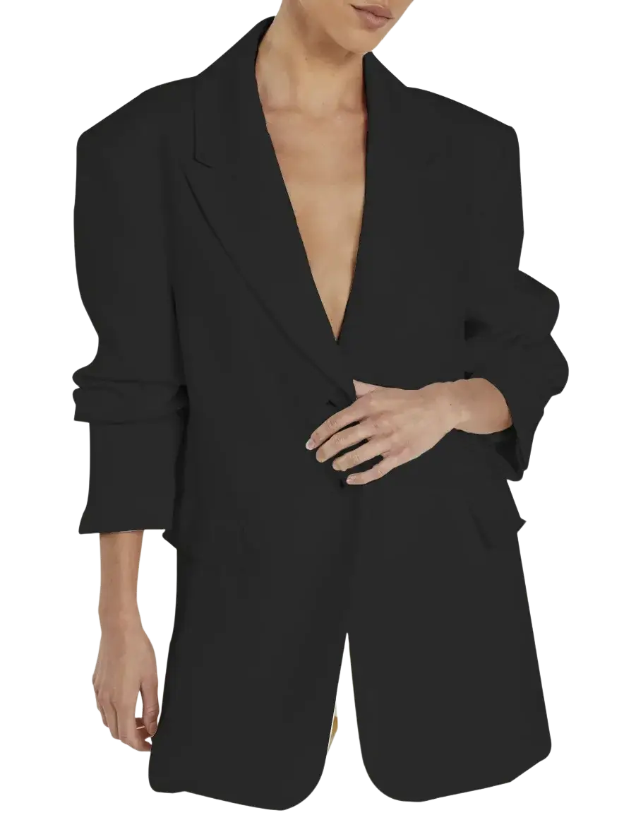 Black oversized women’s casual blazer with deep v-neckline and rolled-up sleeves tailored for office wear