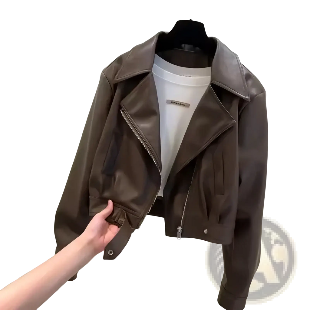 Women’s cropped brown faux leather moto jacket with asymmetrical zipper front and snap-button cuffs
