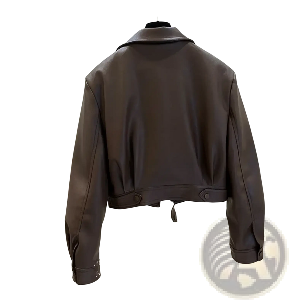 Women’s cropped faux leather moto jacket in brown with collar and buttoned cuffs displayed from the front