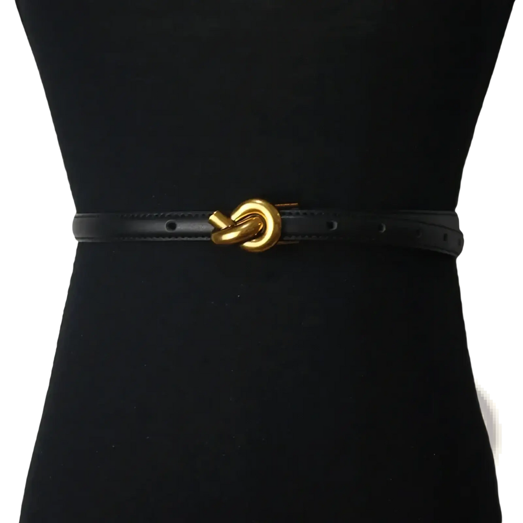 Black leather women’s designer belt featuring a gold-tone knot-shaped buckle for stylish wear