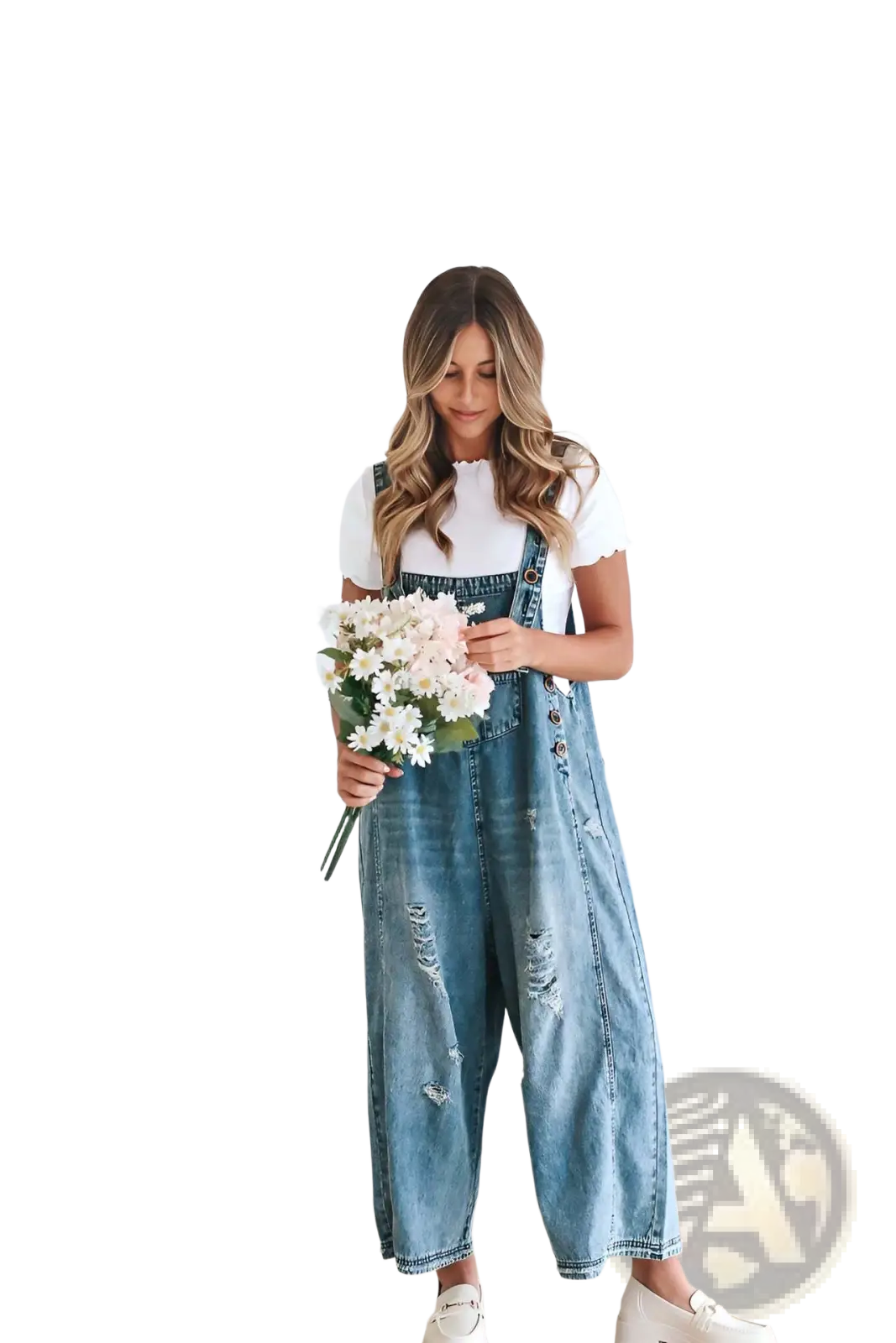 Blue denim women’s distressed overalls with ripped design and button closures featuring adjustable straps